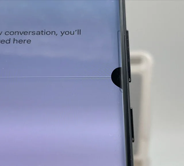 Samsung Galaxy screen with black spots and bleeding ink